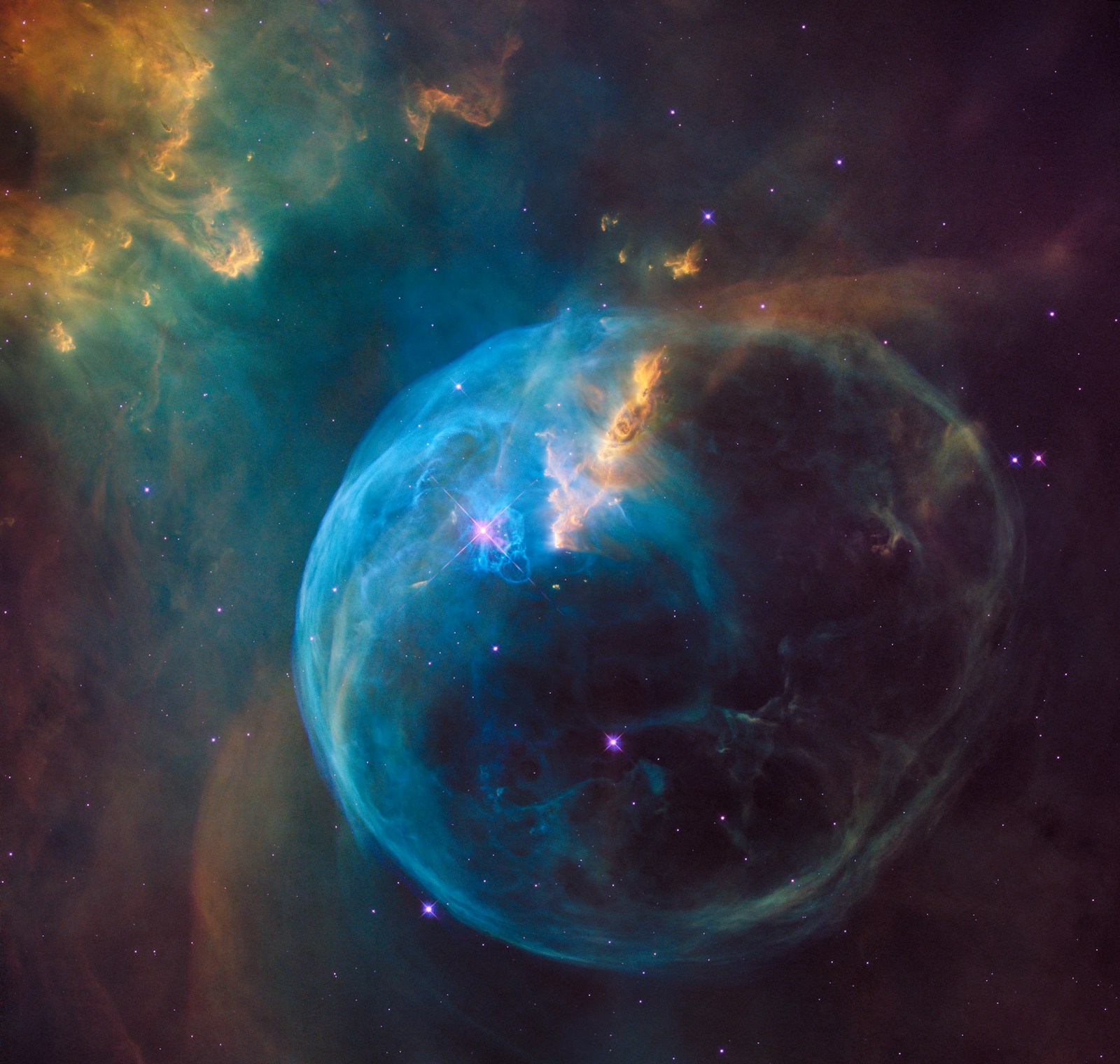 A luminous nebula filled with stars in deep space